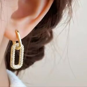 Small hoops with dangle charm